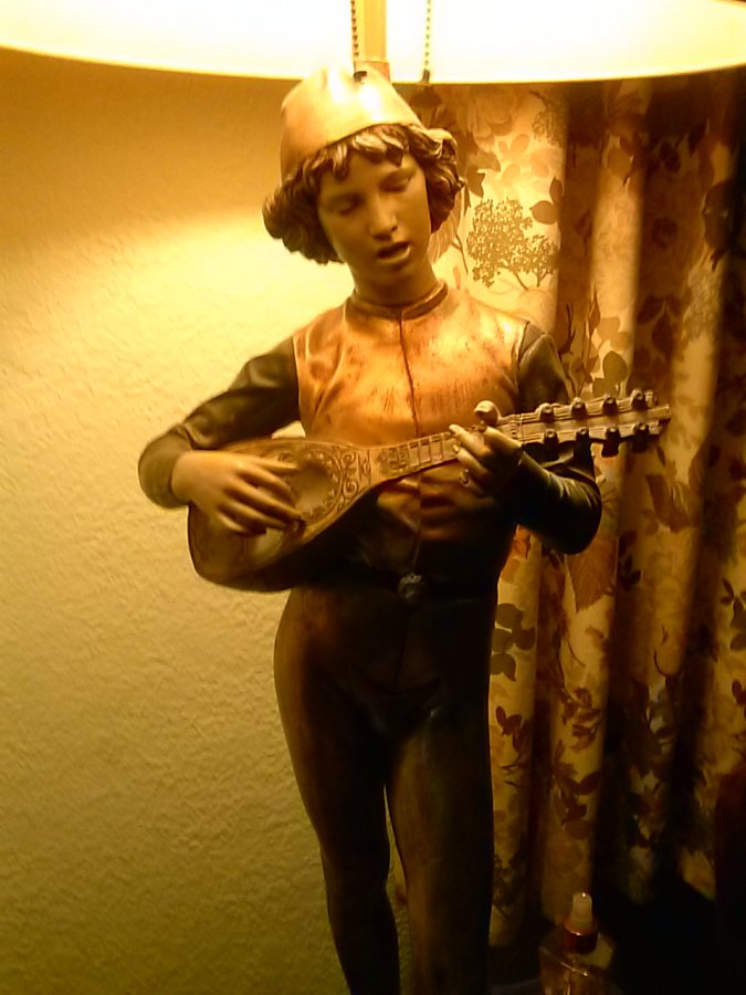 What's ' antique lamp. by b. dubois of a mandolin player ' Worth? Picture