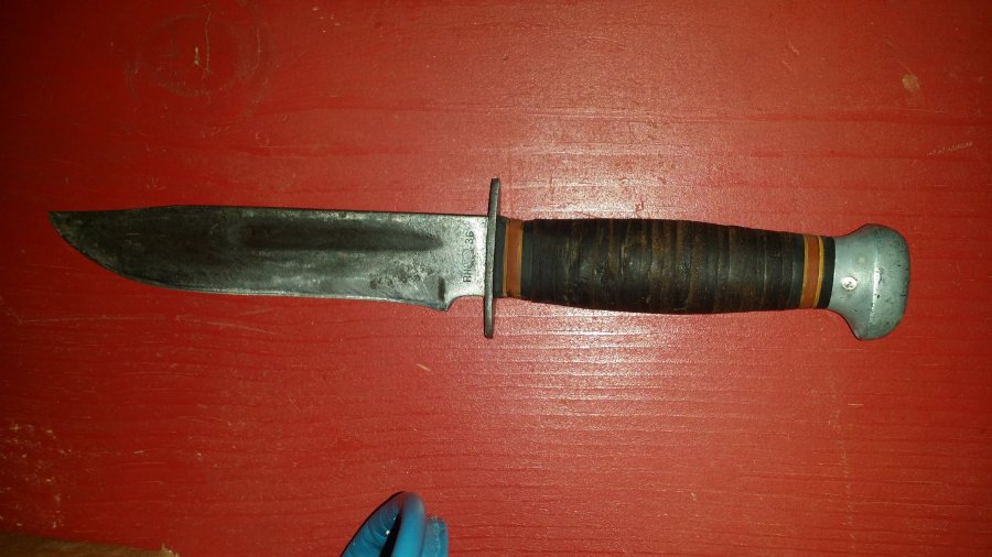 What's 'knife with leather wrapped handle with RH 36 made in USA' Worth? Picture