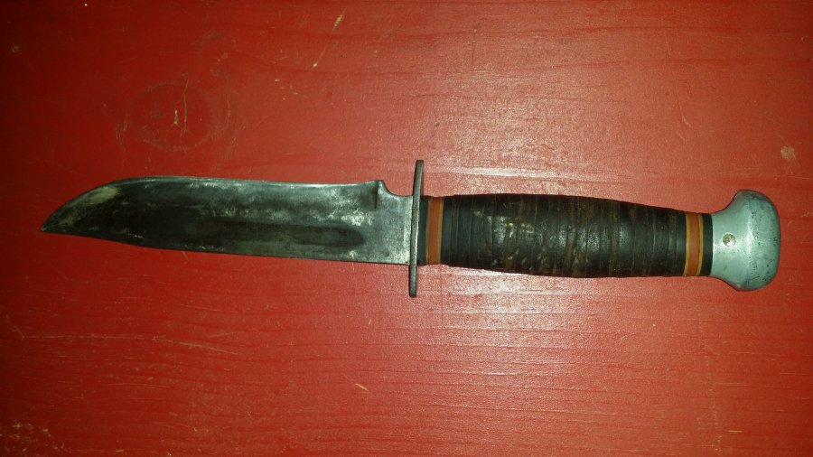 What's 'knife with leather wrapped handle with RH 36 made in USA' Worth? Picture