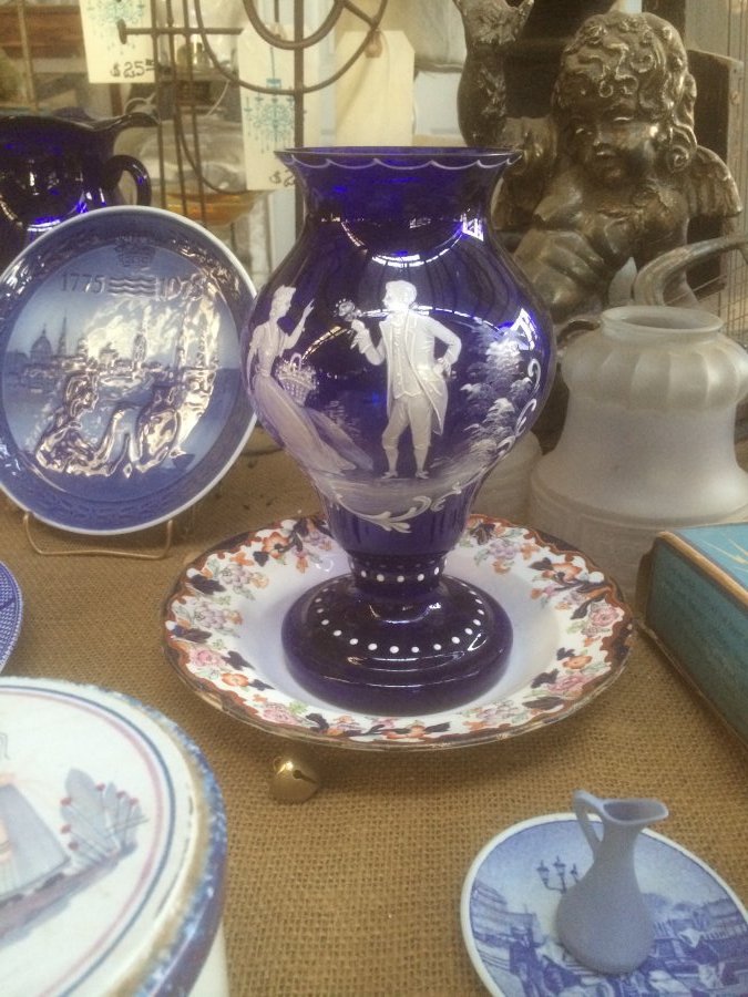What's 'cobalt blue vase with white victorian figures painted' Worth? Picture