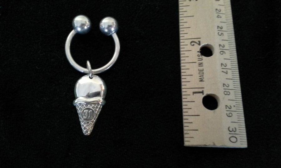 What's 'Tiffany silver key ring with Baskin Robbins ice cream cone pendant.' Worth? Picture 1