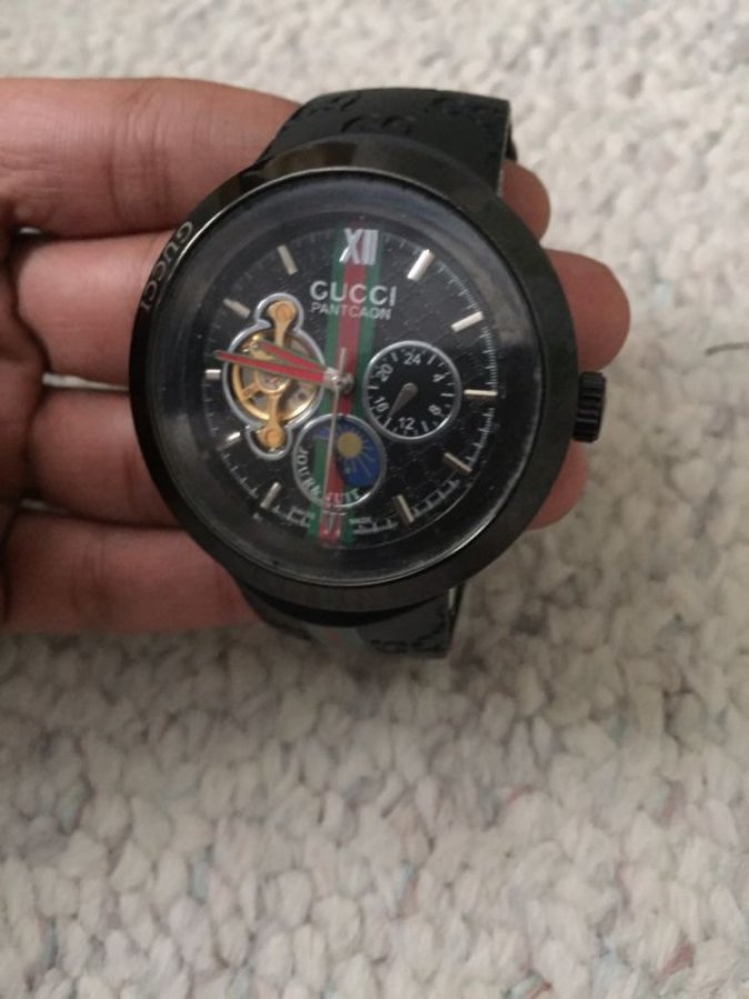 What's 'men's Gucci watch REF 1142' Worth? Picture 1