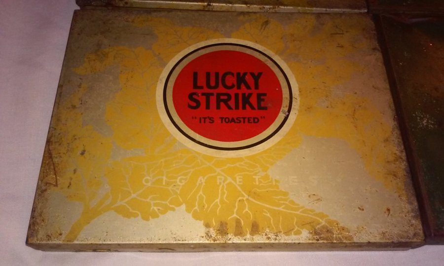 What's 'Lucky strike flat cigarette tin' Worth? Picture